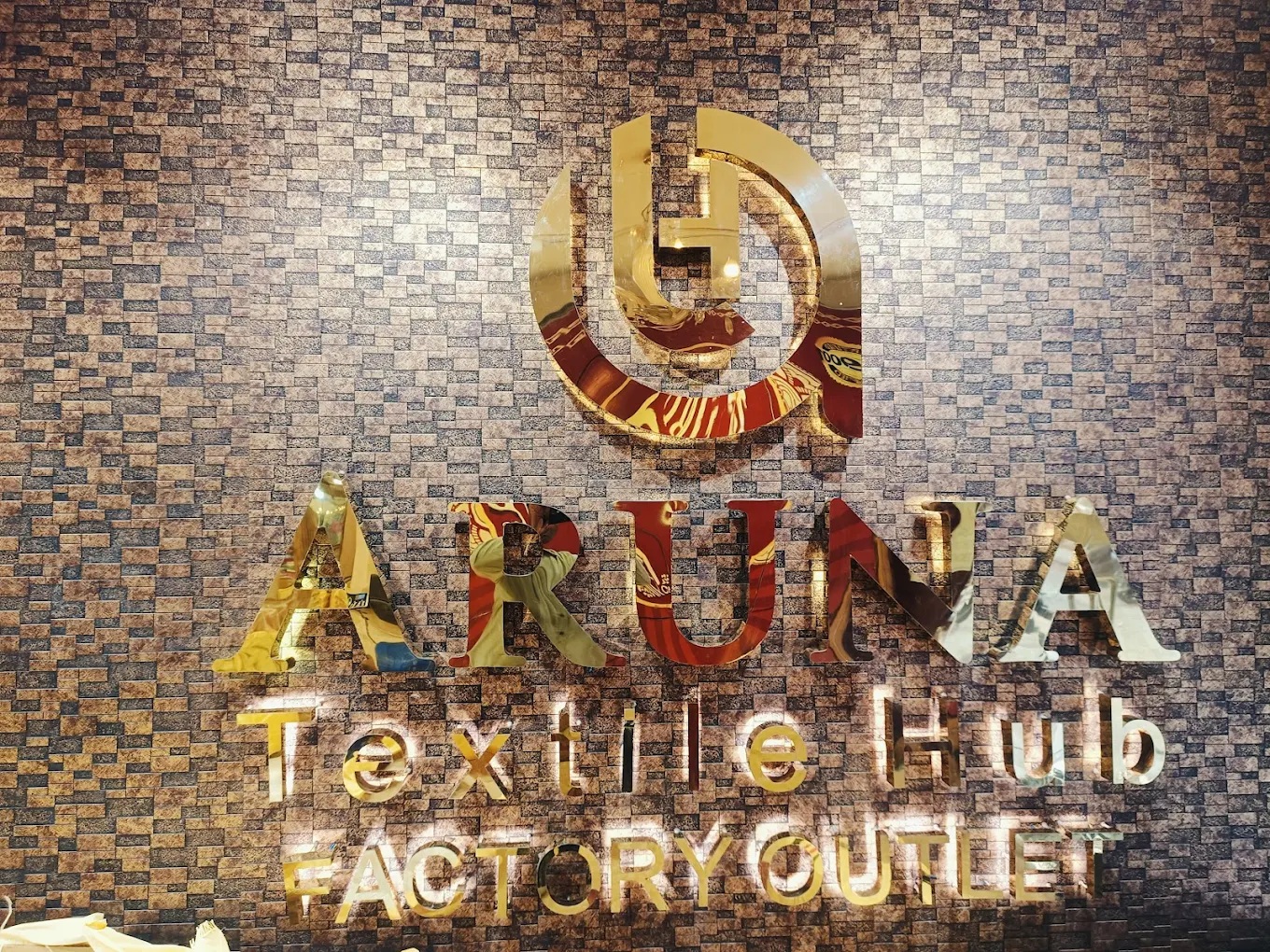 Aruna Textile Hub - Fabric Manufacturer in Surat logo