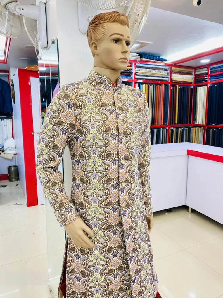 PRAISE COLLECTION RAYMOND SHOP -TAILORS IN BHOPAL logo